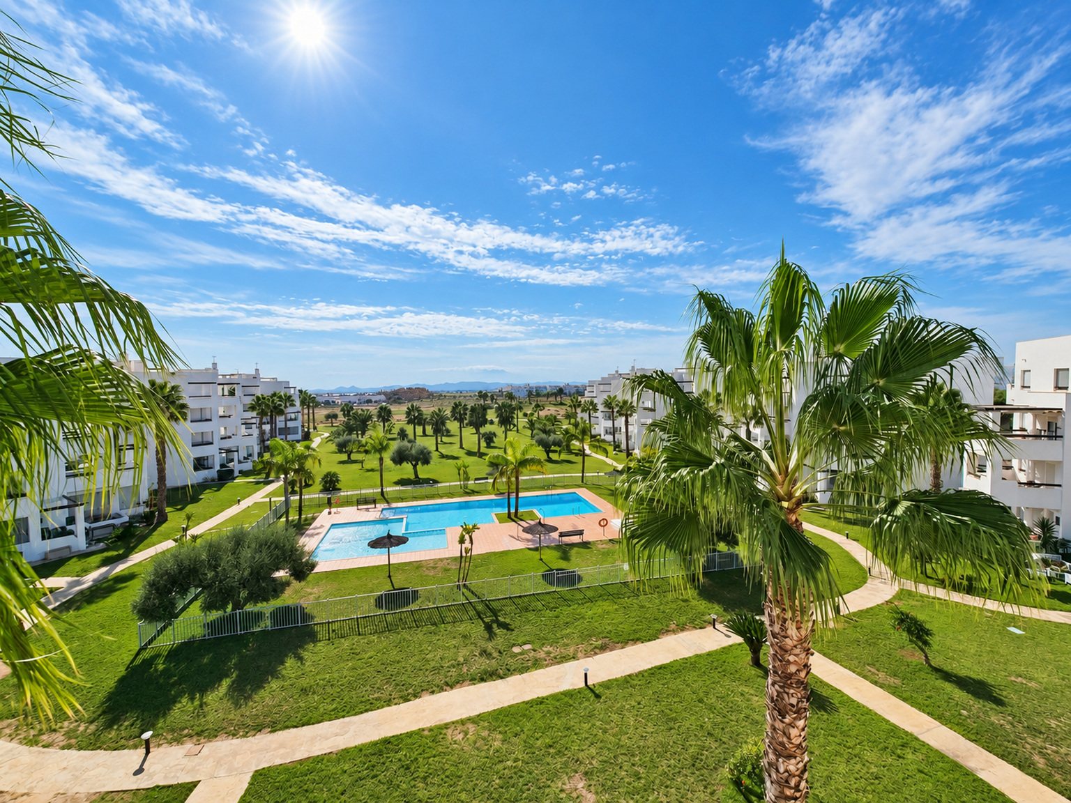 pool and golf view from terrace